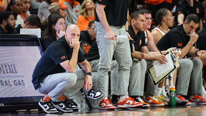 Feb 15, 2025; Stillwater, Oklahoma, USA; Oklahoma State Cowboys coach Steve Lutz watches game play during the second half against the Texas Tech Red Raiders at Gallagher-Iba Arena. Mandatory Credit: William Purnell-Imagn Images Feb 15, 2025; Stillwater, Oklahoma, USA; Oklahoma State Cowboys coach Steve Lutz watches game play during the second half against the Texas Tech Red Raiders at Gallagher-Iba Arena. Mandatory Credit: William Purnell-Imagn Images