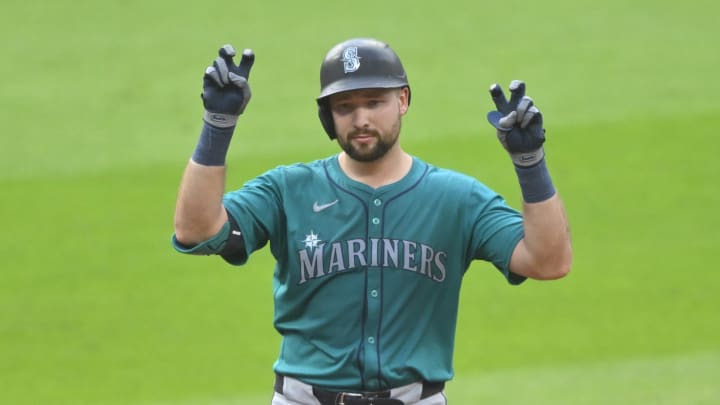 Seattle Mariners catcher Cal Raleigh (29) celebrates his RBI double in the third inning against the Cleveland Guardians at Progressive Field on June 18. Seattle Mariners catcher Cal Raleigh (29) celebrates his RBI double in the third inning against the Cleveland Guardians at Progressive Field on June 18.