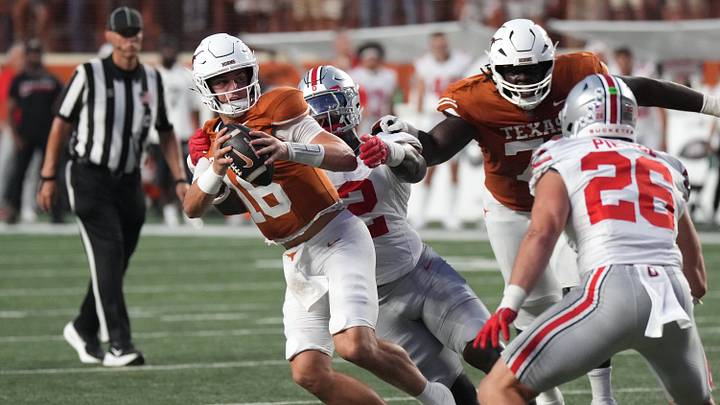Ohio State Buckeyes defensive end Kenyatta Jackson Jr. (2) tackles Texas Longhorns quarterback Arch Manning (16) during the first half at Darrell K Royal-Texas Memorial Stadium Ohio State Buckeyes defensive end Kenyatta Jackson Jr. (2) tackles Texas Longhorns quarterback Arch Manning (16) during the first half at Darrell K Royal-Texas Memorial Stadium