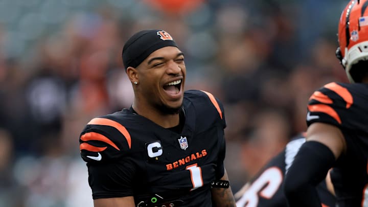 Dec 28, 2025; Cincinnati, Ohio, USA; Cincinnati Bengals wide receiver Ja'Marr Chase (1) talks to wide receiver Mitchell Tinsley (82) before a game against the Arizona Cardinals at Paycor Stadium. Mandatory Credit: Katie Stratman-Imagn Images