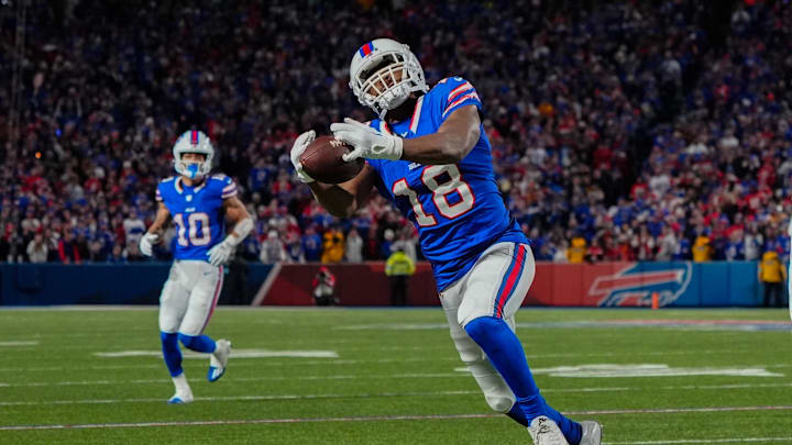 Buffalo Bills wide receiver Amari Cooper makes a catch against the Kansas City Chiefs at Highmark Stadium. Buffalo Bills wide receiver Amari Cooper makes a catch against the Kansas City Chiefs at Highmark Stadium.