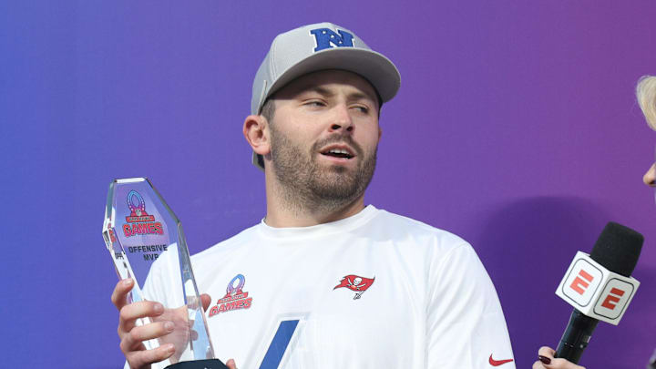NFC quarterback Baker Mayfield of the Tampa Bay Buccaneers is awarded the offensive player of the game award.