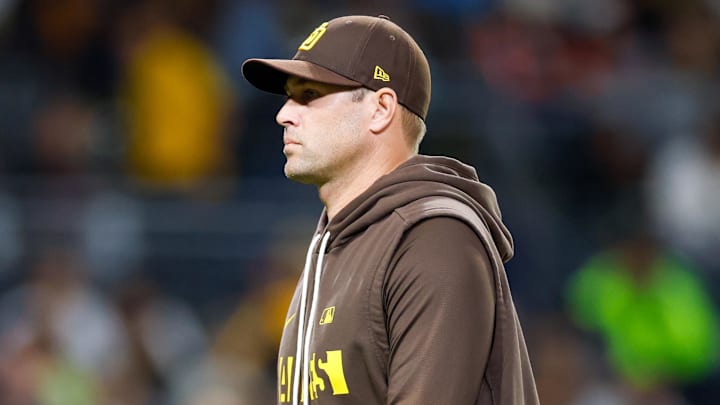 Apr 11, 2026; San Diego, California, USA; San Diego Padres manager Craig Stammen (14) walks off the field after making a pitching change during the seventh inning against the Colorado Rockies at Petco Park. Mandatory Credit: David Frerker-Imagn Images
