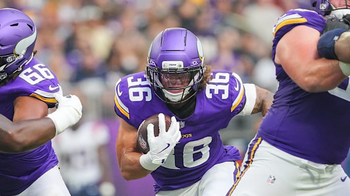 Aug 16, 2025; Minneapolis, Minnesota, USA; Minnesota Vikings running back Zavier Scott (36) runs with the ball against the New England Patriots in the second quarter at U.S. Bank Stadium. Mandatory Credit: Brad Rempel-Imagn Images Aug 16, 2025; Minneapolis, Minnesota, USA; Minnesota Vikings running back Zavier Scott (36) runs with the ball against the New England Patriots in the second quarter at U.S. Bank Stadium. Mandatory Credit: Brad Rempel-Imagn Images