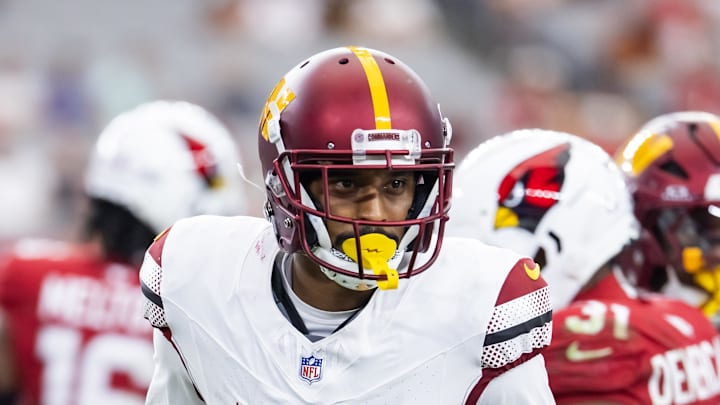 Sep 29, 2024; Glendale, Arizona, USA; Washington Commanders cornerback Michael Davis (24) against the Arizona Cardinals at State Farm Stadium. Mandatory Credit: Mark J. Rebilas-Imagn Images