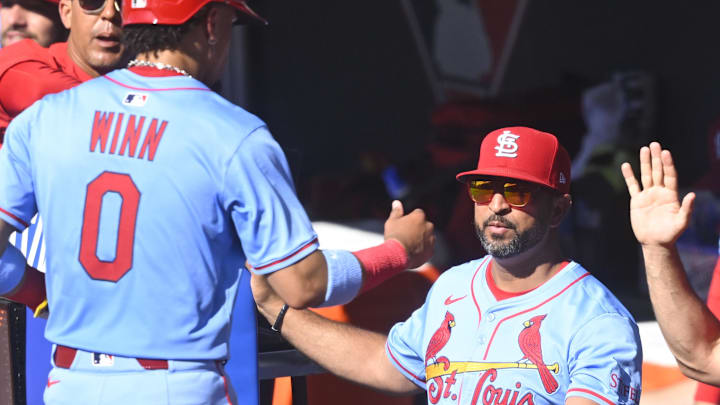 Jun 28, 2025; Cleveland, Ohio, USA; St. Louis Cardinals shortstop Masyn Winn (0) is congratulated by manager Oliver Marmol (37) after scoring in the fifth inning against the Cleveland Guardians at Progressive Field. Mandatory Credit: David Richard-Imagn Images