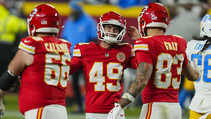 Dec 8, 2024; Kansas City, Missouri, USA; Kansas City Chiefs place kicker Matthew Wright (49) celebrates after kicking a game winning field goal as time expires against the Los Angeles Chargers at GEHA Field at Arrowhead Stadium. Mandatory Credit: Jay Biggerstaff-Imagn Images