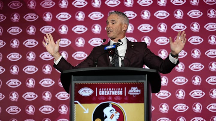 Jul 23, 2025; Charlotte, NC, USA; aFlorida State head coach Mike Norvell answers questions from the media during ACC Media days at Hilton Charlotte Uptown. Mandatory Credit: Jim Dedmon-Imagn Images