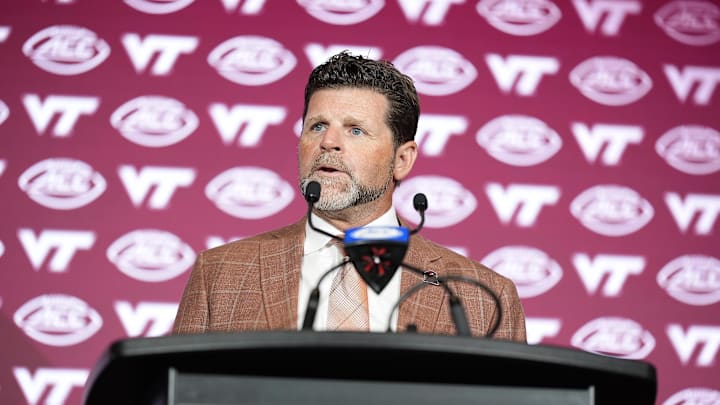 Jul 24, 2025; Charlotte, NC, USA;  Virginia Tech head coach Brent Pry answers questions from the media during ACC Media Days at Hilton Charlotte Uptown. Mandatory Credit: Jim Dedmon-Imagn Images