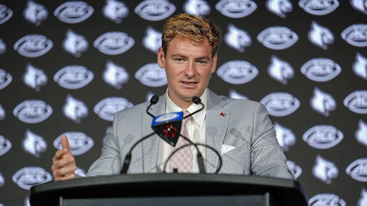 Jul 23, 2025; Charlotte, NC, USA; Louisville quarterback Miller Moss answers questions from the media during ACC Media days at Hilton Charlotte Uptown. Mandatory Credit: Jim Dedmon-Imagn Images Jul 23, 2025; Charlotte, NC, USA; Louisville quarterback Miller Moss answers questions from the media during ACC Media days at Hilton Charlotte Uptown. Mandatory Credit: Jim Dedmon-Imagn Images