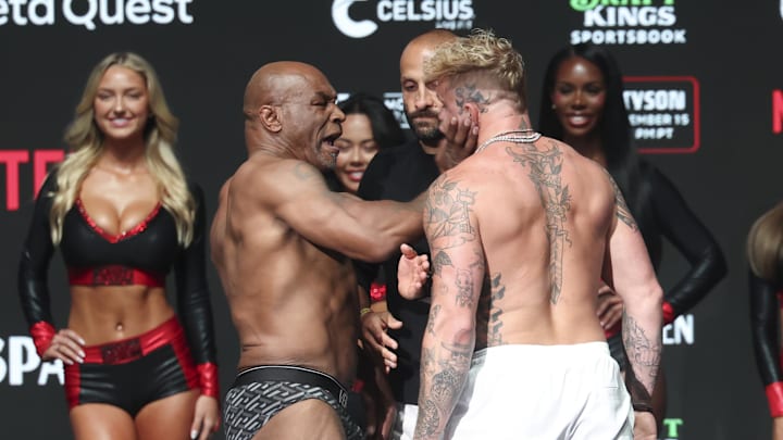 Nov 14, 2024: Mike Tyson slaps Jake Paul after weighing in with Sydney Thomas in the background Nov 14, 2024: Mike Tyson slaps Jake Paul after weighing in with Sydney Thomas in the background