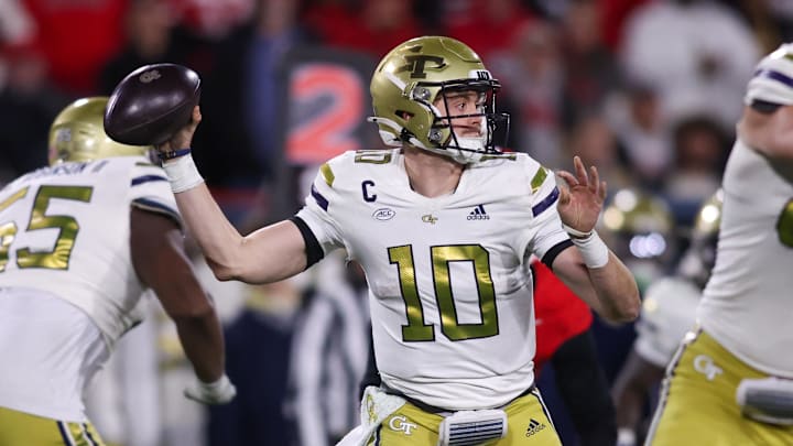 Nov 29, 2024; Athens, Georgia, USA; Georgia Tech Yellow Jackets quarterback Haynes King (10) throws a pass against the Georgia Bulldogs in the second quarter at Sanford Stadium. Mandatory Credit: Brett Davis-Imagn Images