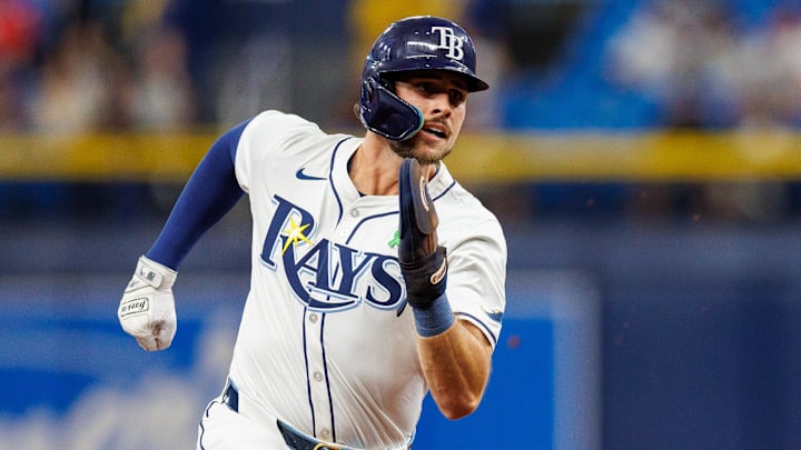 May 21, 2024; St. Petersburg, Florida, USA; Tampa Bay Rays designated hitter Josh Lowe (15) runs to third base against the Boston Red Sox in the first inning at Tropicana Field. May 21, 2024; St. Petersburg, Florida, USA; Tampa Bay Rays designated hitter Josh Lowe (15) runs to third base against the Boston Red Sox in the first inning at Tropicana Field.