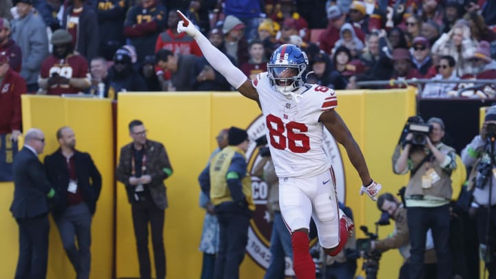 Nov 19, 2023; Landover, Maryland, USA; New York Giants wide receiver Darius Slayton (86) celebrates after scoring a touchdown against the Washington Commanders during the second quarter at FedExField. Nov 19, 2023; Landover, Maryland, USA; New York Giants wide receiver Darius Slayton (86) celebrates after scoring a touchdown against the Washington Commanders during the second quarter at FedExField.