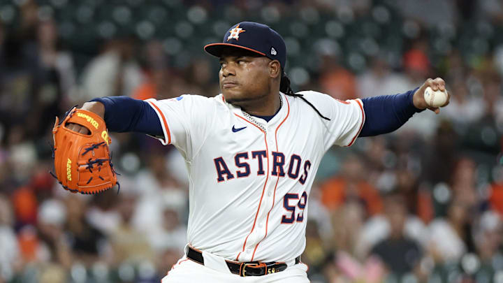 Apr 20, 2025; Houston, Texas, USA; Houston Astros starting pitcher Framber Valdez (59) pitches against the San Diego Padres in the first inning at Daikin Park.
