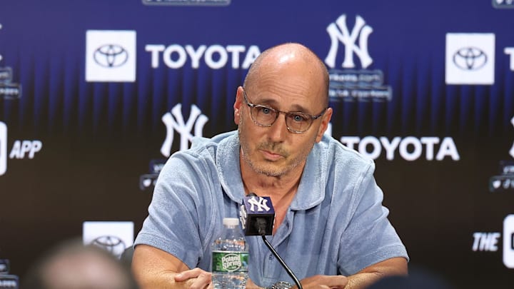 Aug 23, 2023; Bronx, New York, USA; New York Yankees general manager Brian Cashman talks with the media before the game between the Yankees and the Washington Nationals at Yankee Stadium. Mandatory Credit: Vincent Carchietta-Imagn Images