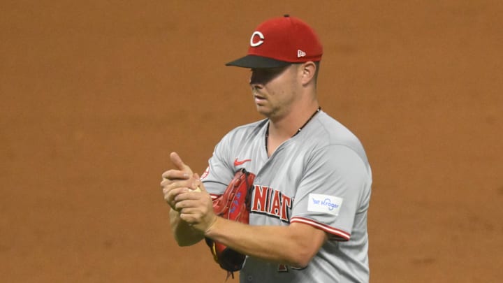 Sep 25, 2024; Cleveland, Ohio, USA; Cincinnati Reds relief pitcher Emilio Pagan (15) reacts in the eighth inning against the Cleveland Guardians at Progressive Field. Mandatory Credit: David Richard-Imagn Images