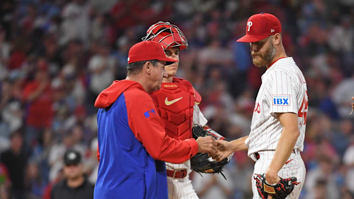 Apr 29, 2025; Philadelphia, Pennsylvania, USA; Philadelphia Phillies manager Rob Thomson (59) takes the ball from pitcher Zack Wheeler (45) against the Washington Nationals at Citizens Bank Park.