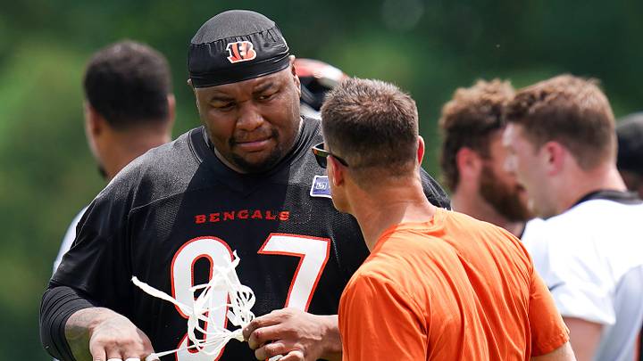 Cincinnati Bengals defensive tackle Dexter Lawrence II (97) unwraps his fingers during practice on Tuesday, June 9, 2026, at Kettering Health Practice Fields in downtown Cincinnati. Cincinnati Bengals defensive tackle Dexter Lawrence II (97) unwraps his fingers during practice on Tuesday, June 9, 2026, at Kettering Health Practice Fields in downtown Cincinnati.
