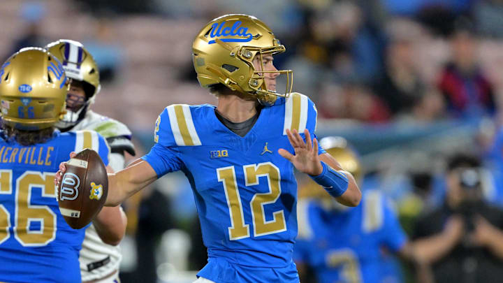 Nov 22, 2025; Pasadena, California, USA;  UCLA Bruins quarterback Luke Duncan (12) throws a pass during the second half against the Washington Huskies at the Rose Bowl. Mandatory Credit: Jayne Kamin-Oncea-Imagn Images