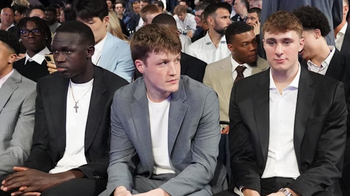 May 12, 2025; Chicago, Illinois, US; Duke players R-L Cooper Flagg, Kon Knueppel,and Khaman Maluach. during the 2025 NBA Draft Lottery at McCormick Place. Mandatory Credit: David Banks-Imagn Images