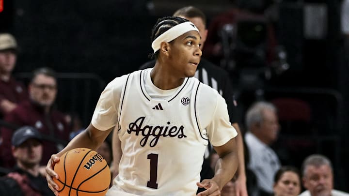 Feb 11, 2025; College Station, Texas, USA; Texas A&M Aggies guard Zhuric Phelps (1) dribbles the ball during the second half against the Georgia Bulldogs at Reed Arena. Mandatory Credit: Maria Lysaker-Imagn Images 