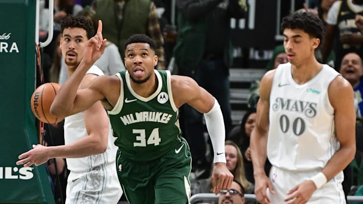 Mar 5, 2025; Milwaukee, Wisconsin, USA; Milwaukee Bucks forward Giannis Antetokounmpo (34) reacts after scoring his 20,000th career point in the third quarter against the Dallas Mavericks at Fiserv Forum. Mandatory Credit: Benny Sieu-Imagn Images Mar 5, 2025; Milwaukee, Wisconsin, USA; Milwaukee Bucks forward Giannis Antetokounmpo (34) reacts after scoring his 20,000th career point in the third quarter against the Dallas Mavericks at Fiserv Forum. Mandatory Credit: Benny Sieu-Imagn Images