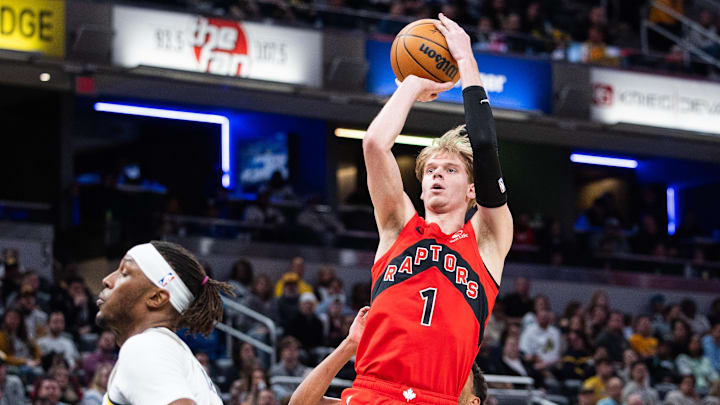 Feb 26, 2025; Indianapolis, Indiana, USA; Toronto Raptors guard Gradey Dick (1) shoots the ball while Indiana Pacers center Myles Turner (33) defends in the first half at Gainbridge Fieldhouse. Mandatory Credit: Trevor Ruszkowski-Imagn Images Feb 26, 2025; Indianapolis, Indiana, USA; Toronto Raptors guard Gradey Dick (1) shoots the ball while Indiana Pacers center Myles Turner (33) defends in the first half at Gainbridge Fieldhouse. Mandatory Credit: Trevor Ruszkowski-Imagn Images