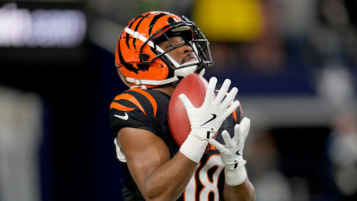 Cincinnati Bengals wide receiver Isaiah Williams (18) makes a catch during warm-ups before facing the Dallas Cowboys for Monday Night Football at AT&T Stadium on Monday, December 9, 2024.