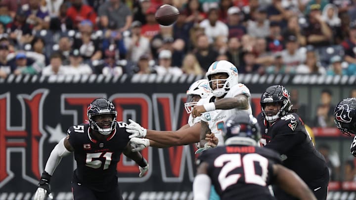 Miami Dolphins quarterback Tua Tagovailoa (1) passes against the Houston Texans in the second quarter at NRG Stadium.