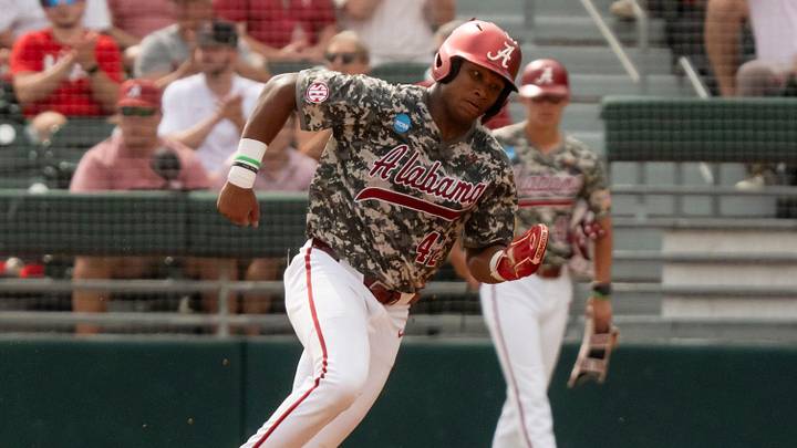 Jun 7, 2026; Tuscaloosa, AL, USA; Alabama base runner Eric Hines (42) goes from first to third on a hit in Game 2 of the Super Regional between Alabama and St. John's at Sewell-Thomas Stadium. Jun 7, 2026; Tuscaloosa, AL, USA; Alabama base runner Eric Hines (42) goes from first to third on a hit in Game 2 of the Super Regional between Alabama and St. John's at Sewell-Thomas Stadium.