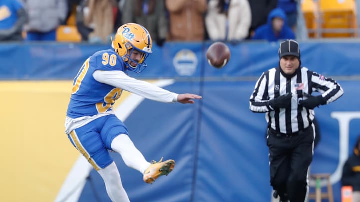 Nov 19, 2022; Pittsburgh, Pennsylvania, USA;  Pittsburgh Panthers place kicker Ben Sauls (90) kicks the ball to the Duke Blue Devils during the fourth quarter at Acrisure Stadium. Mandatory Credit: Charles LeClaire-Imagn Images