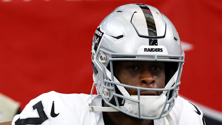 Dec 21, 2025; Houston, Texas, USA;Las Vegas Raiders quarterback Geno Smith (7) runs out of the tunnel  before playing against the Houston Texans at NRG Stadium. Mandatory Credit: Thomas Shea-Imagn Images