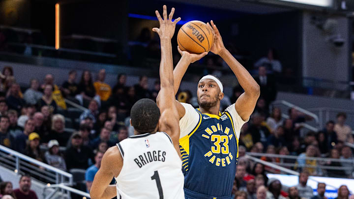 Apr 1, 2024; Indianapolis, Indiana, USA; Indiana Pacers center Myles Turner (33) shoots the ball