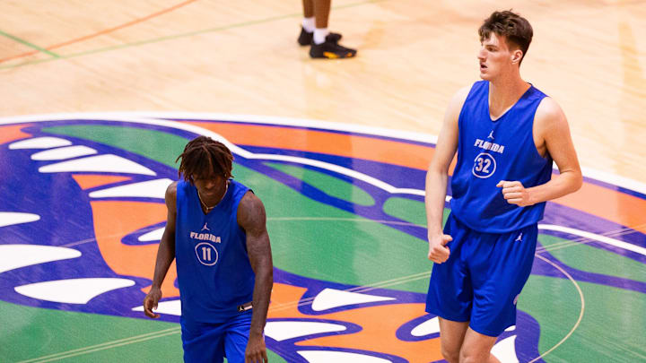 Florida Gators center Olivier Rioux (32) runs Karaokes as the Florida Gators men’s basketball team held a practice on John W. Frost II Practice Court in Gainesville, FL on Tuesday, September 24, 2024. [Doug Engle/Gainesville Sun]