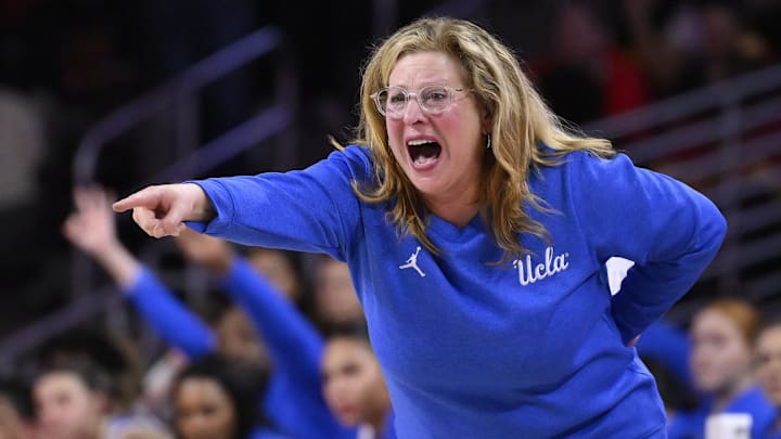 Feb 13, 2025; Los Angeles, California, USA;  UCLA Bruins head coach Cori Close yells to her team during the second quarter against the USC Trojans at Galen Center. Mandatory Credit: Robert Hanashiro-Imagn Images