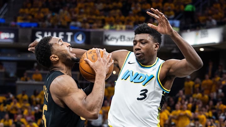 May 9, 2025; Indianapolis, Indiana, USA; Cleveland Cavaliers guard Donovan Mitchell (45) shoots the ball while Indiana Pacers center Thomas Bryant (3) defends during game three of the second round for the 2025 NBA Playoffs at Gainbridge Fieldhouse. Mandatory Credit: Trevor Ruszkowski-Imagn Images May 9, 2025; Indianapolis, Indiana, USA; Cleveland Cavaliers guard Donovan Mitchell (45) shoots the ball while Indiana Pacers center Thomas Bryant (3) defends during game three of the second round for the 2025 NBA Playoffs at Gainbridge Fieldhouse. Mandatory Credit: Trevor Ruszkowski-Imagn Images