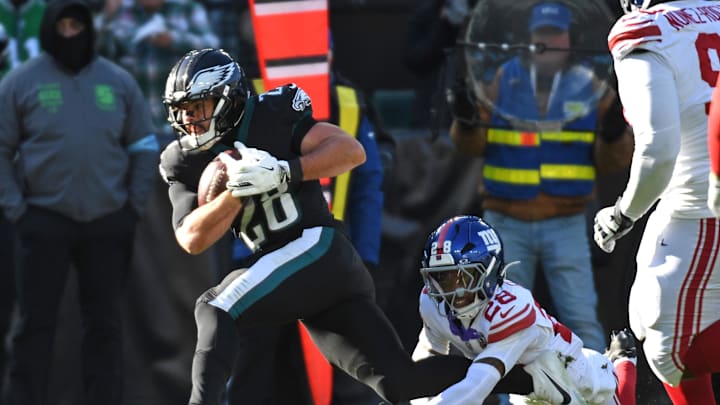 Jan 5, 2025; Philadelphia, Pennsylvania, USA; Philadelphia Eagles running back Will Shipley (28) is tackled by New York Giants cornerback Cor'Dale Flott (28) during the second quarter at Lincoln Financial Field. Jan 5, 2025; Philadelphia, Pennsylvania, USA; Philadelphia Eagles running back Will Shipley (28) is tackled by New York Giants cornerback Cor'Dale Flott (28) during the second quarter at Lincoln Financial Field.