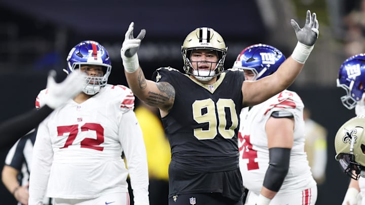 Oct 5, 2025; New Orleans, Louisiana, USA; New Orleans Saints defensive tackle Bryan Bresee (90) reacts after a play against the New York Giants during the first half at Caesars Superdome. Mandatory Credit: Stephen Lew-Imagn Images