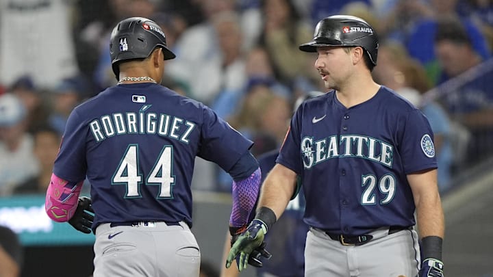 Oct 20, 2025; Toronto, Ontario, CAN; Seattle Mariners center fielder Julio Rodriguez (44) celebrates with catcher Cal Raleigh (29) after hitting a solo home run against the Toronto Blue Jays in the third inning during game seven of the ALCS round for the 2025 MLB playoffs at Rogers Centre. Mandatory Credit: John E. Sokolowski-Imagn Images Oct 20, 2025; Toronto, Ontario, CAN; Seattle Mariners center fielder Julio Rodriguez (44) celebrates with catcher Cal Raleigh (29) after hitting a solo home run against the Toronto Blue Jays in the third inning during game seven of the ALCS round for the 2025 MLB playoffs at Rogers Centre. Mandatory Credit: John E. Sokolowski-Imagn Images