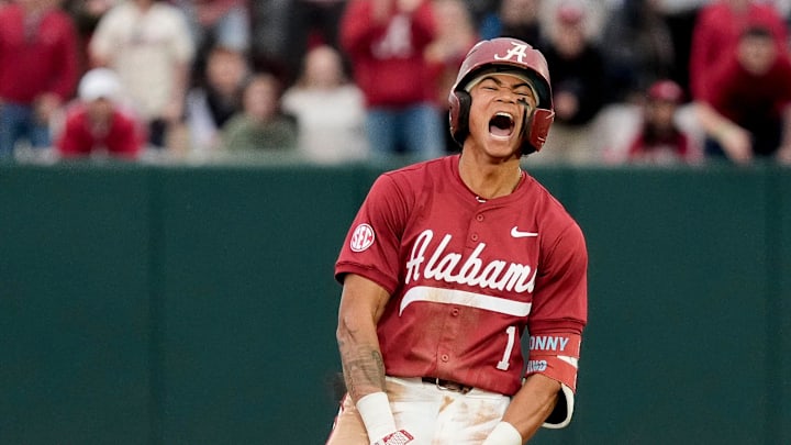 Feb 14, 2025; Tuscaloosa, AL, USA; Justin Lebron celebrates at second after hitting a three-run double during Alabama baseball’s opening day at Sewell-Thomas Stadium against Bradley. The Crimson Tide defeated Bradley 10-6.