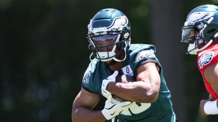 May 30, 2024; Philadelphia, PA, USA; Philadelphia Eagles running back Saquon Barkley (26) runs with the ball during practice at NovaCare Complex. 