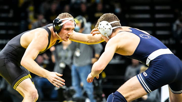 Penn State's Terrell Barraclough (right) competes against Iowa during a Big Ten match.