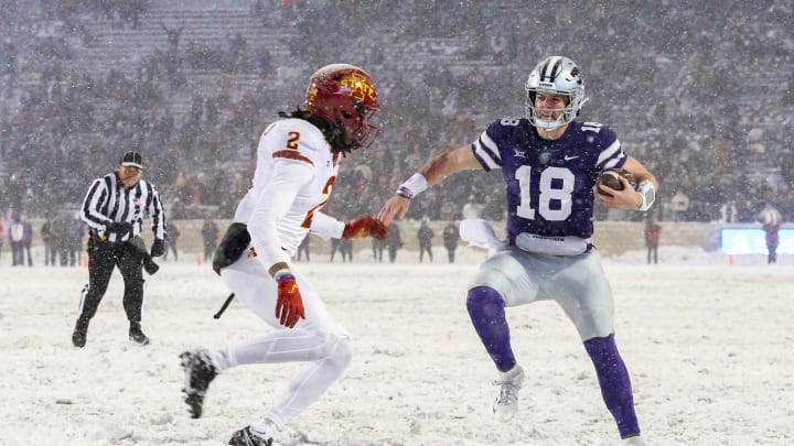 Nov 25, 2023; Manhattan, Kansas, USA; Kansas State Wildcats quarterback Will Howard (18) looks for