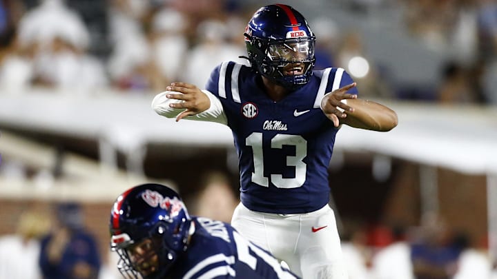 Aug 31, 2024; Oxford, Mississippi, USA; Mississippi Rebels quarterback Austin Simmons (13) gives direction prior to the snap against the Furman Paladins during the second half at Vaught-Hemingway Stadium. Mandatory Credit: Petre Thomas-Imagn Images