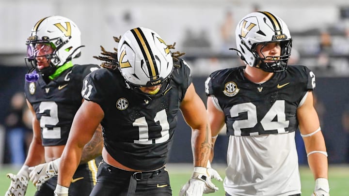 Vanderbilt linebacker Bryan Longwell (11) celebrates over Auburn wide receiver Cam Coleman (8) during the third quarter at FirstBank Stadium in Nashville, Tenn., Saturday, Nov. 8, 2025.