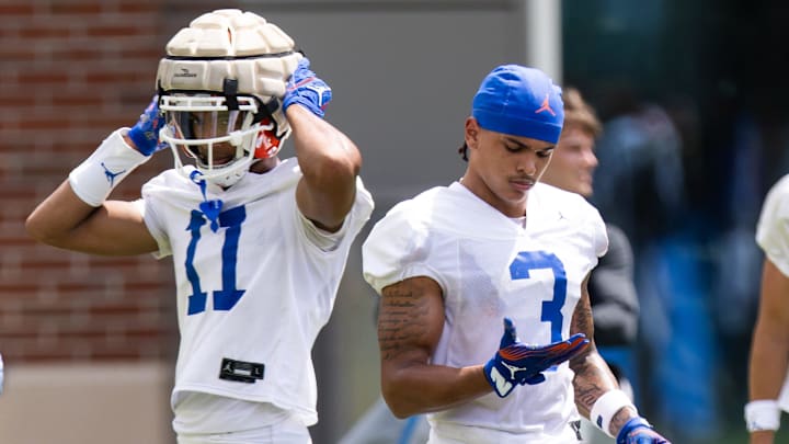 Florida Gators wide receiver Eugene Wilson III (3) checks his gloves during Fall practice at Sanders Practice Fields in Gainesville, FL on Thursday, August 1, 2024. [Doug Engle/Gainesville Sun]