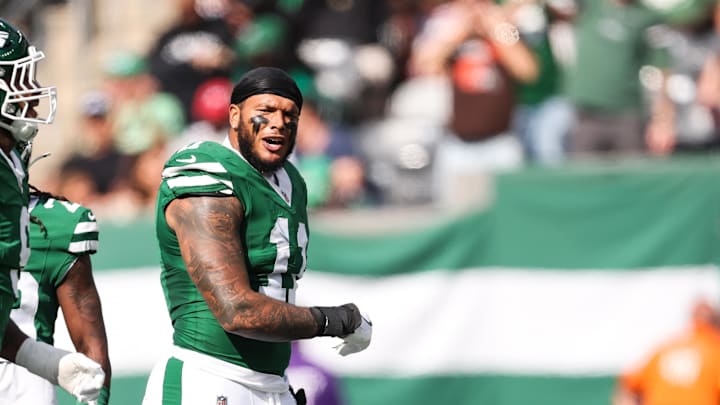 Oct 19, 2025; East Rutherford, New Jersey, USA; New York Jets linebacker Jermaine Johnson (11) celebrates a defensive stop in the first quarter against the Carolina Panthers at MetLife Stadium. Mandatory Credit: Vincent Carchietta-Imagn Images Oct 19, 2025; East Rutherford, New Jersey, USA; New York Jets linebacker Jermaine Johnson (11) celebrates a defensive stop in the first quarter against the Carolina Panthers at MetLife Stadium. Mandatory Credit: Vincent Carchietta-Imagn Images