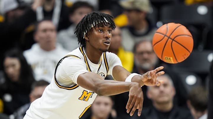 Feb 8, 2025; Columbia, Missouri, USA; Missouri Tigers guard Anthony Robinson II (0) passes the ball during the second half against the Texas A&M Aggies at Mizzou Arena. Mandatory Credit: Jay Biggerstaff-Imagn Images Feb 8, 2025; Columbia, Missouri, USA; Missouri Tigers guard Anthony Robinson II (0) passes the ball during the second half against the Texas A&M Aggies at Mizzou Arena. Mandatory Credit: Jay Biggerstaff-Imagn Images
