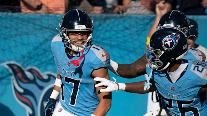 Tennessee wide receiver Chimere Dike (17) his 90 yard punt return for a touchdown against Seattle during their game at Nissan Stadium Sunday, Nov. 23, 2025. Tennessee wide receiver Chimere Dike (17) his 90 yard punt return for a touchdown against Seattle during their game at Nissan Stadium Sunday, Nov. 23, 2025.